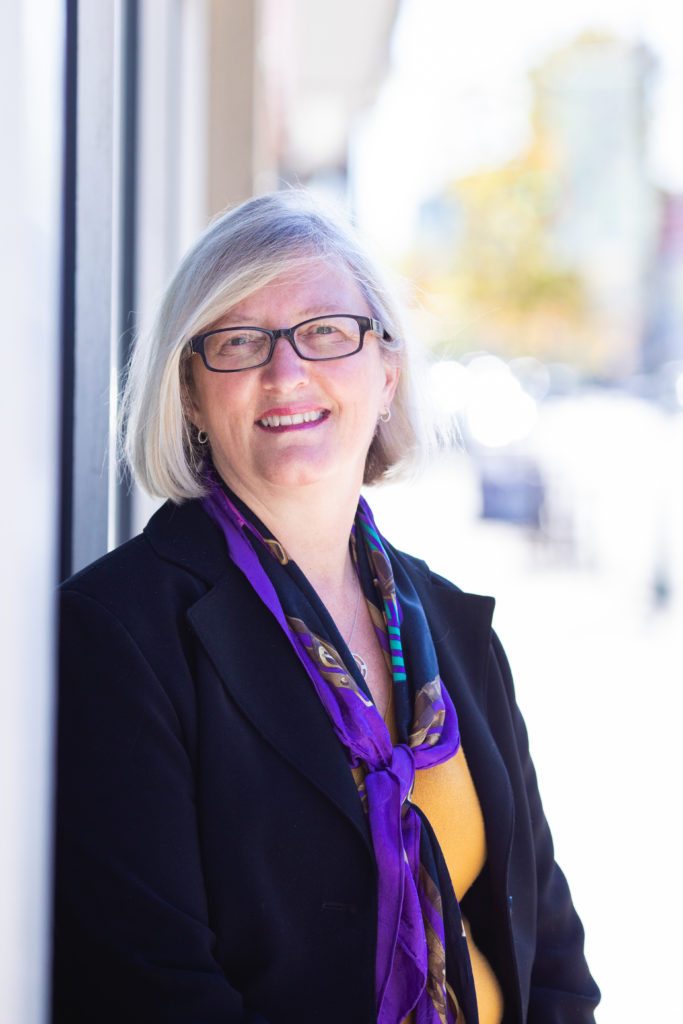 Smiling professional caucasian woman with glasses
