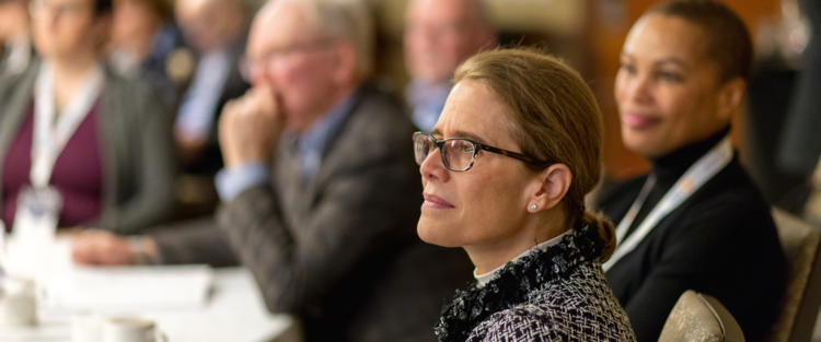 Professional women listening to a presentation