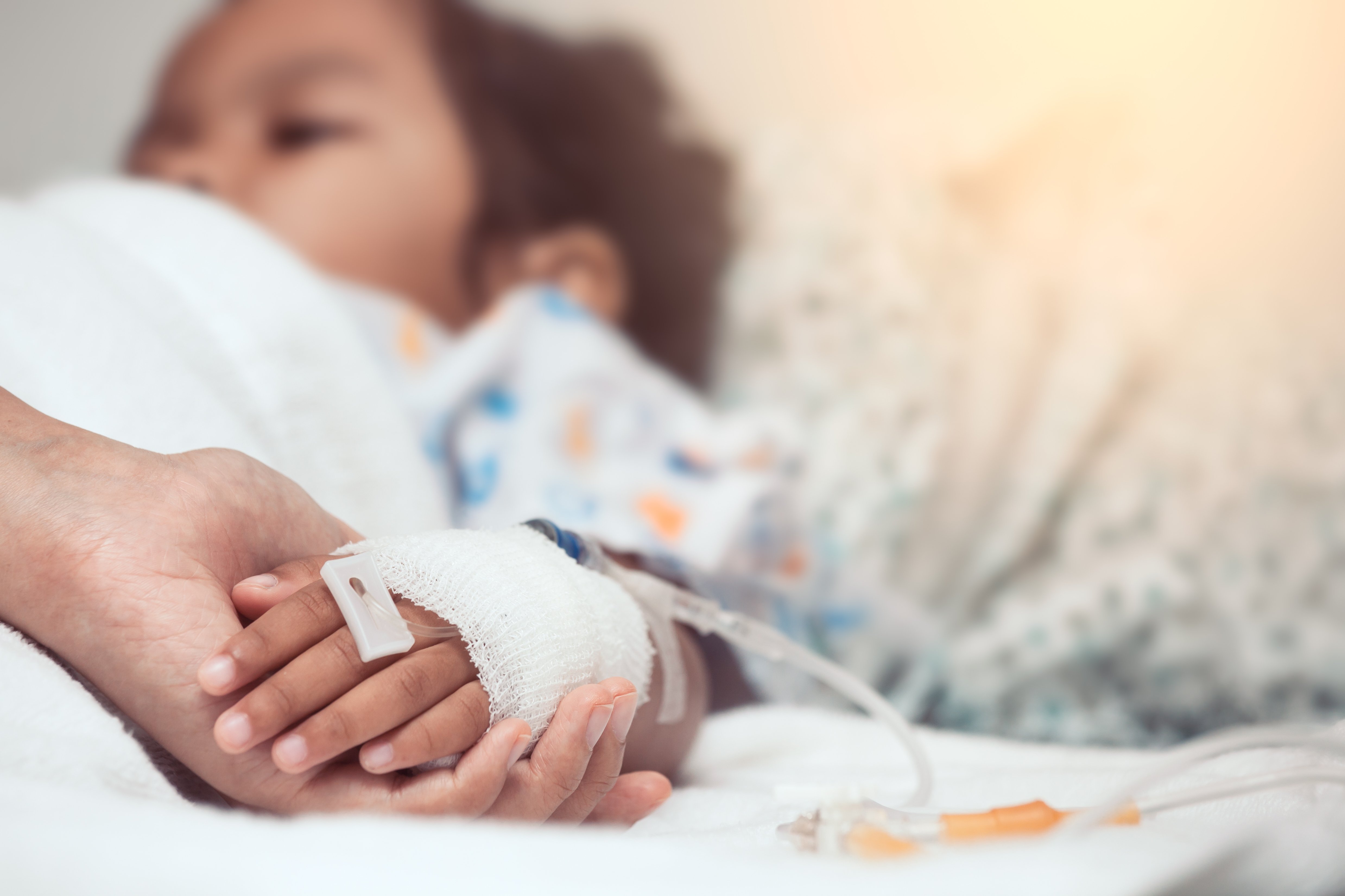 child in hospital bed